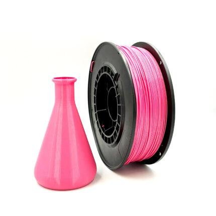 PETG Pink next to a flask made from it. Highest quality filament on the market. Purchase 3D filaments made only in EU.